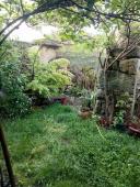 Semi-detached , partially renovated cottage, with garden and bodegas