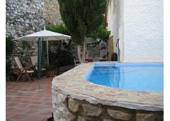 COMFORTABLE AND REFURBISHED 4 BEDROOM FINCA WITH COSY PATIO AND POOL PLUS A GARDEN.