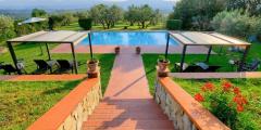 Tuscan style farmhouse with swimming pool park