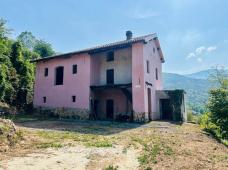 Farmhouse with land and private water source