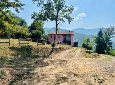 Farmhouse with land and private water source