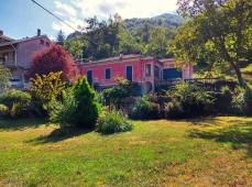 Large house to renovate with large private land in the village