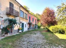 Large house to renovate with large private land in the village