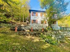 Detached villa with surrounding land