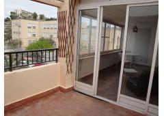 Sunny top floor flat with terraces for selling in Alicante, Spain