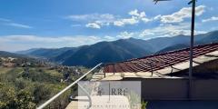 Semi-detached house with terrace overlooking the valley in Aquila d’Arroscia