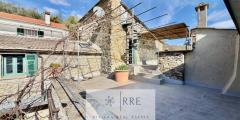 Semi-detached house with terrace overlooking the valley in Aquila d’Arroscia