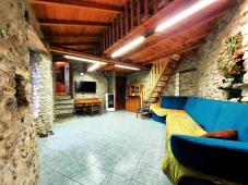 House with stone and wood finishes