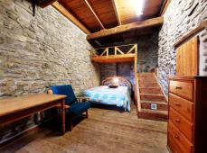 House with stone and wood finishes