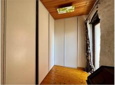 For sale Two-level village house with storage room and land in the characteristic medieval hamlet of